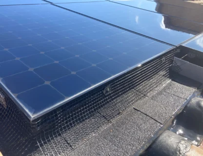 Close-up view of pristine solar panels reflecting sunlight